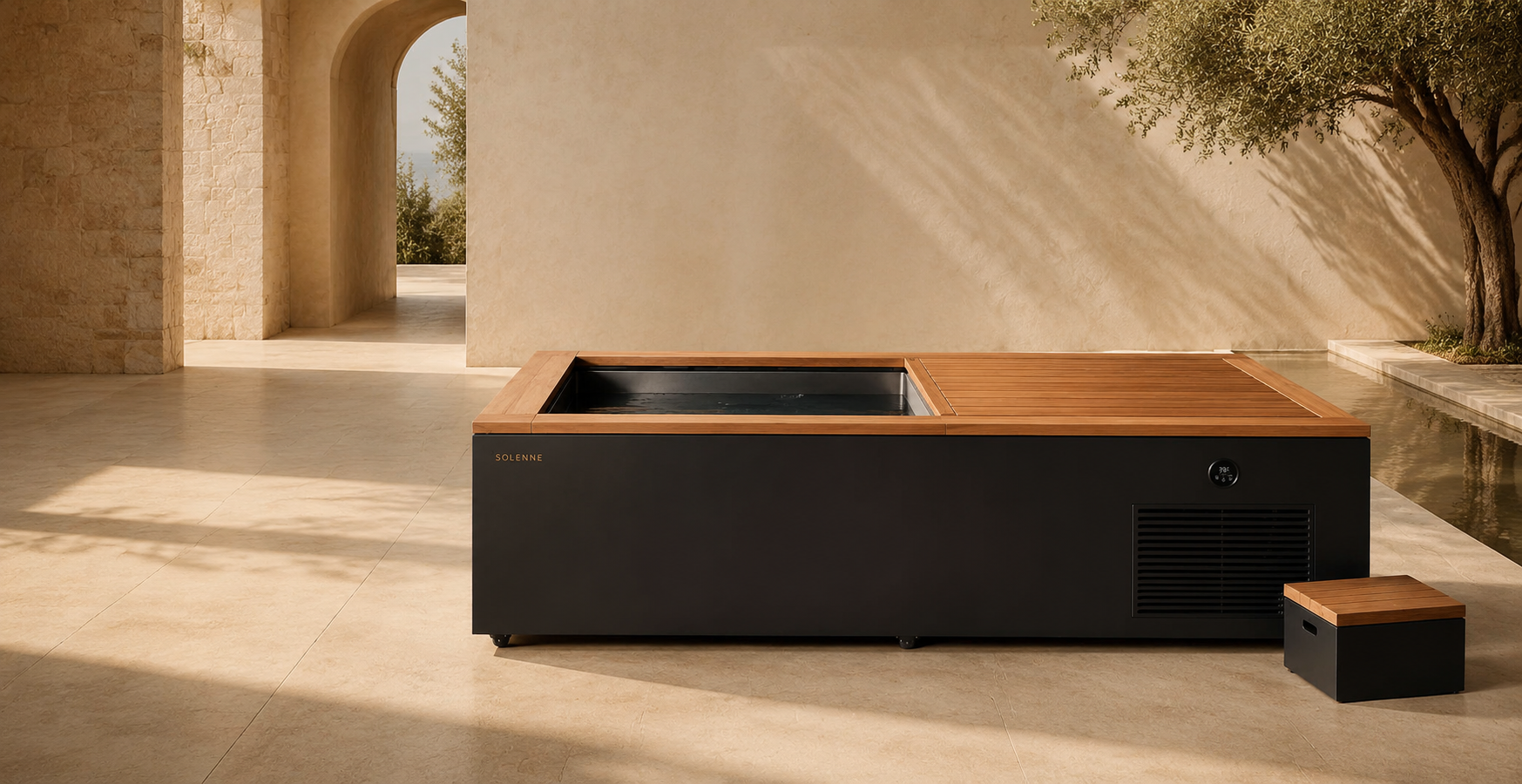 SOLENNE Privé cold immersion system in a sculptural limestone wellness courtyard
